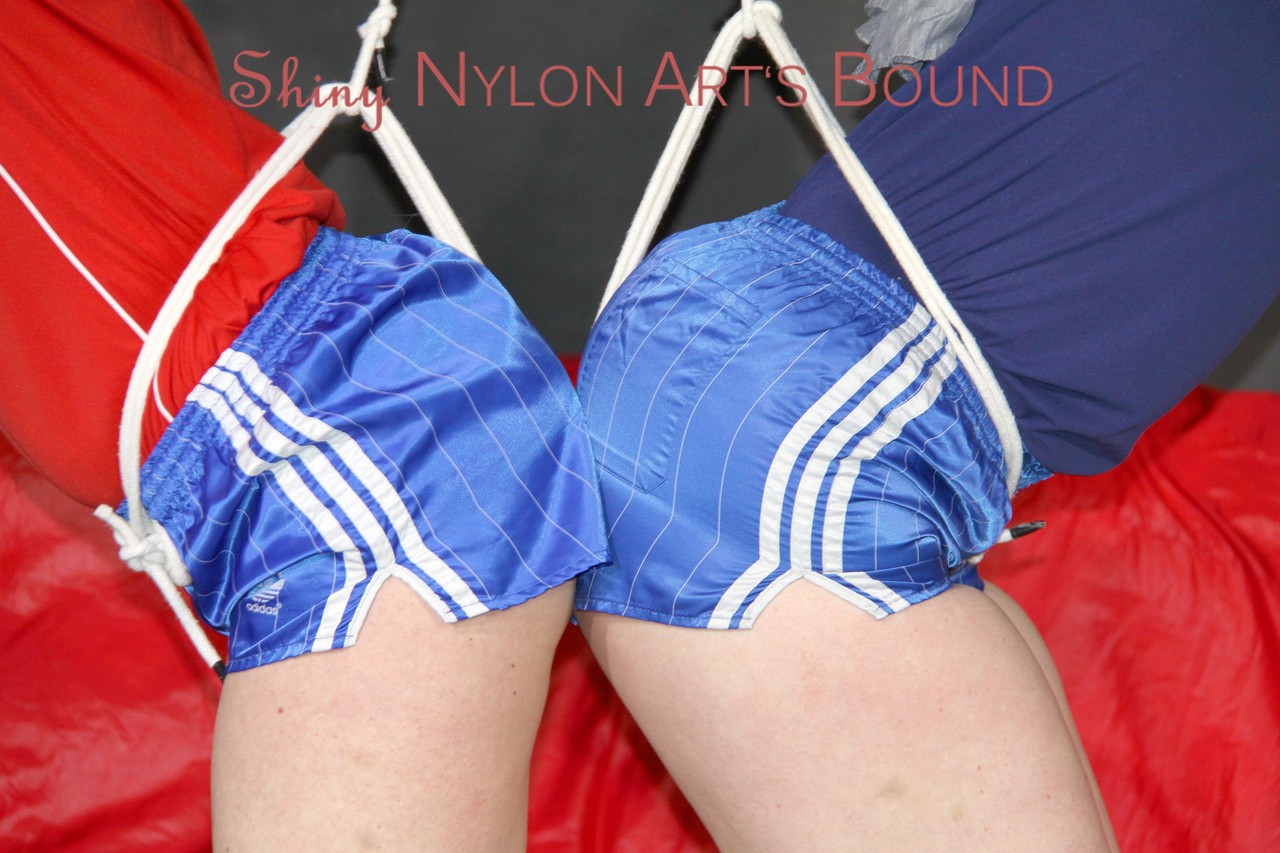 Jill and Sophie wearing sexy shiny nylon shorts and shirts tied and gagged foto porno #425439257