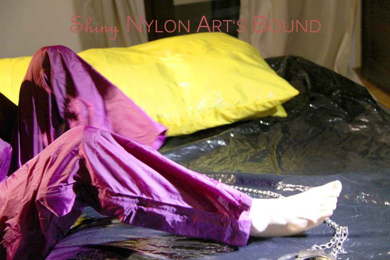 Sonja ties, gagges and hoodes herself with hand cuffs on a bed wearing a foto porno #428602047 | Shiny Nylon Arts Bound Pics, Fetish, porno mobile