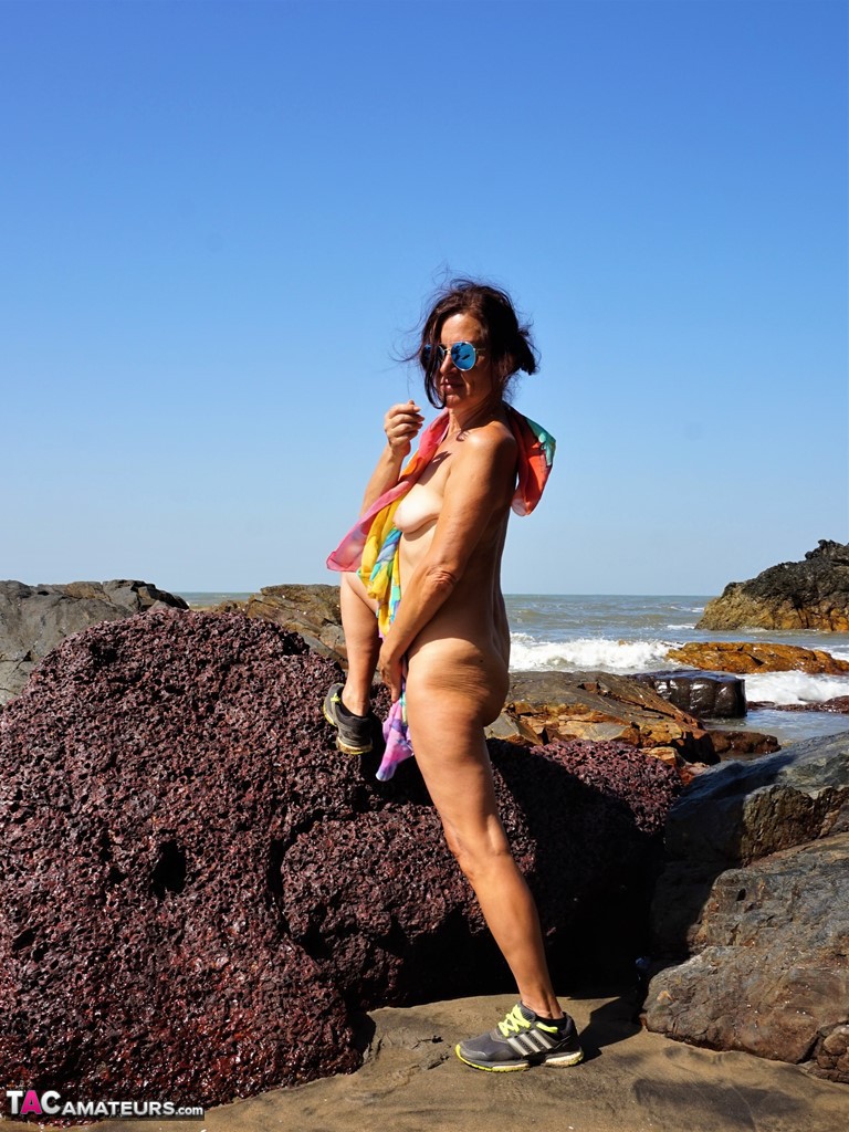 Mature Amateur Diana Ananta Is Joined On The Beach By Her Nudist Friends