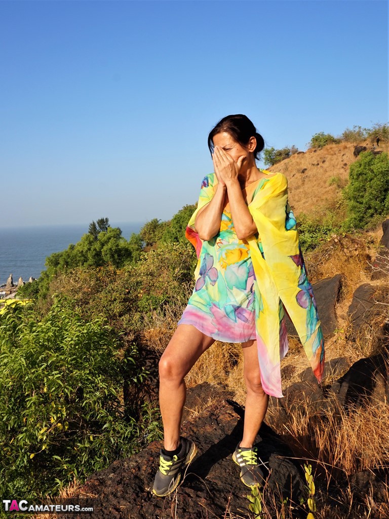 Older Lady Diana Ananta Exposes Herself During A Hike To A Shrine Atop A Cliff