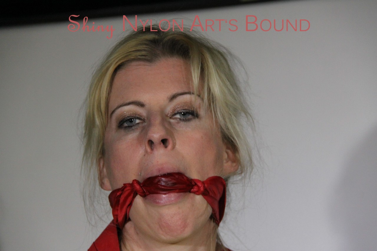 Sexy Lucy tied an gagged with ropes and a cloth gag wearing a super hot red porn photo #426465096