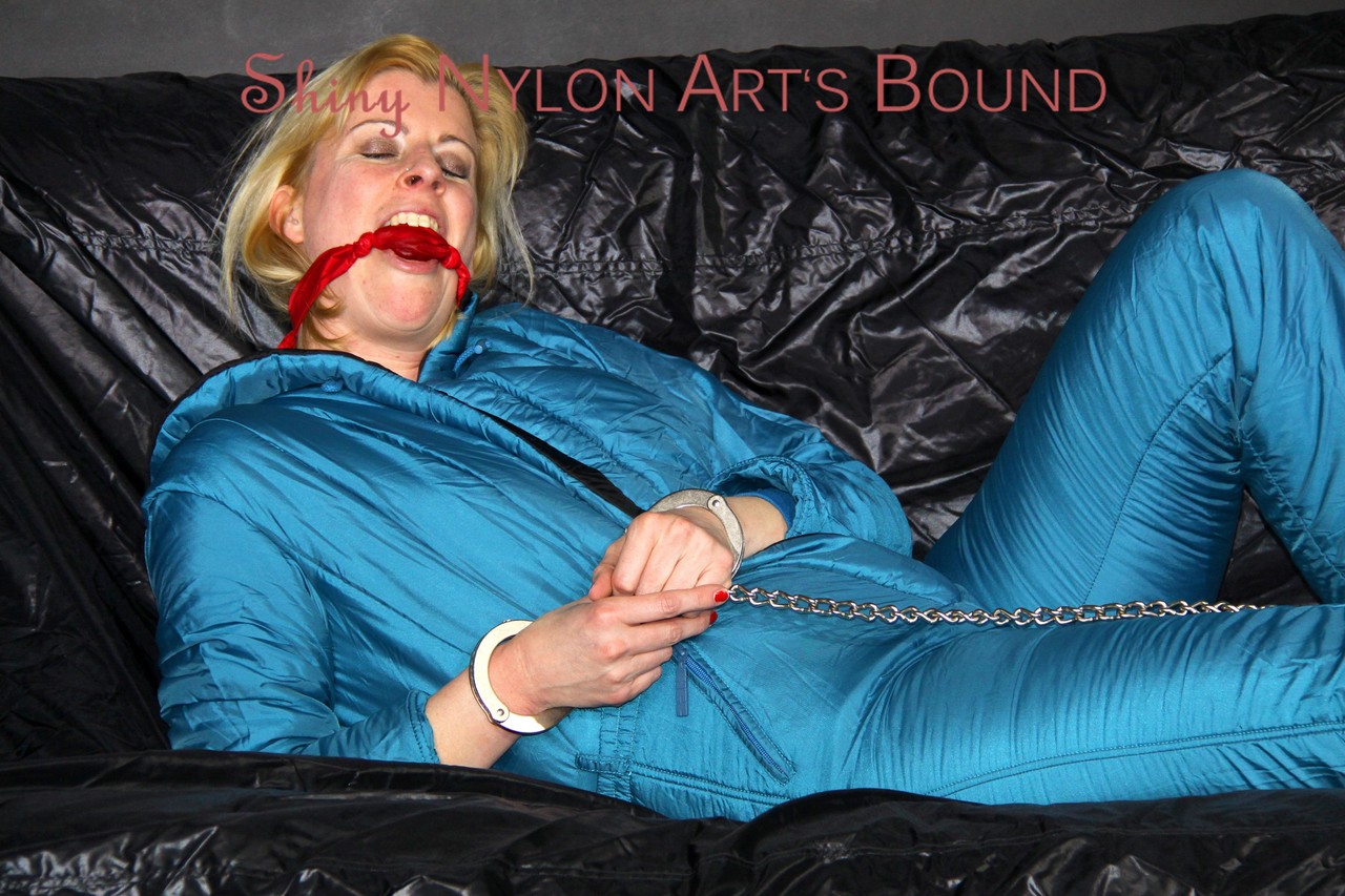 The super-cute oldschool downsuit with green ties and Pia's gagging pose on the floor.