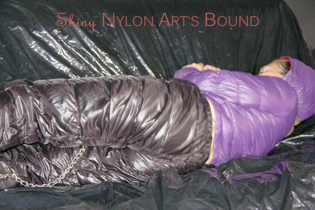 On the sofa, Sandra was restrained and gagged, with cuffs and an ornate pillory wearing hot purple.