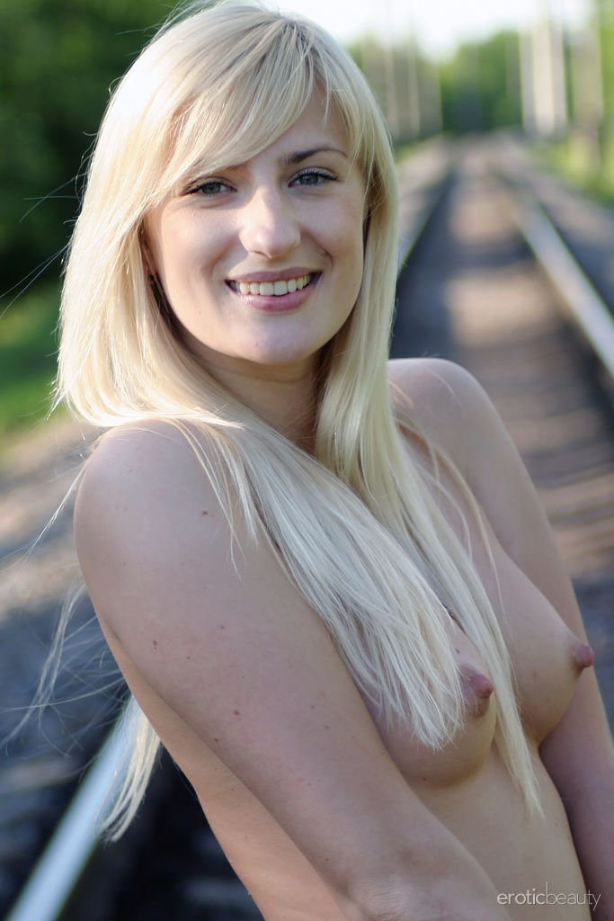 Leggy blonde Margo H strips to ankle strap heels on railway tracks porn photo #422659154