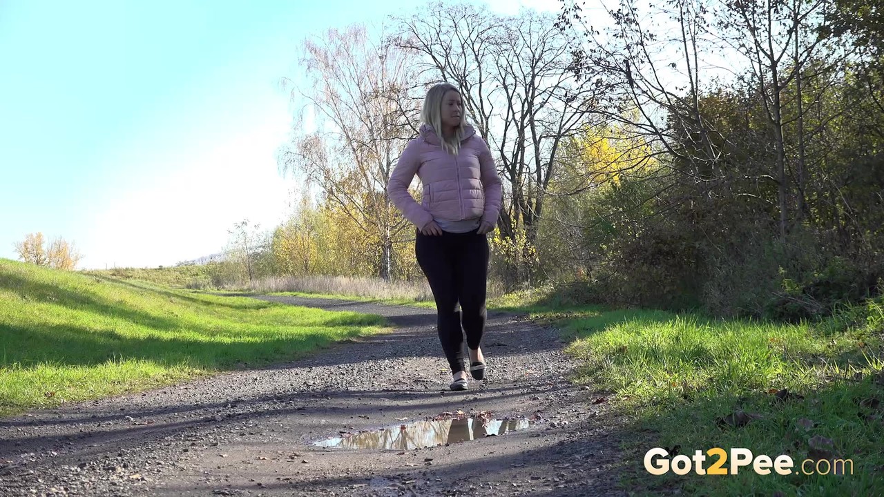 Blonde Licky Lex pees in a puddle outside porn photo #425319802