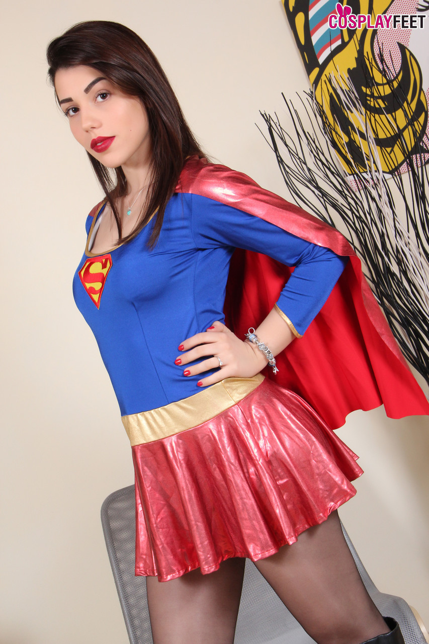 Gorgeous girl Petra shows her hose attired feet in a Superman costume porn photo #423194333