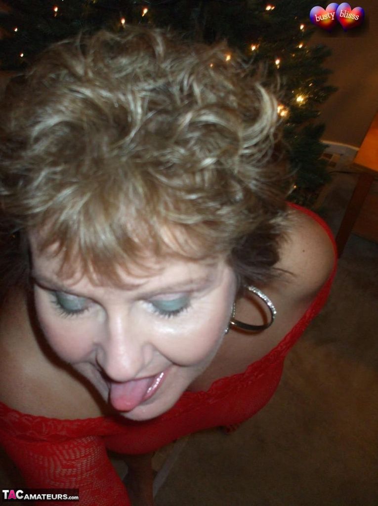 Mature lady Busty Bliss exposes her breasts during a Christmas celebration photo porno #422972988