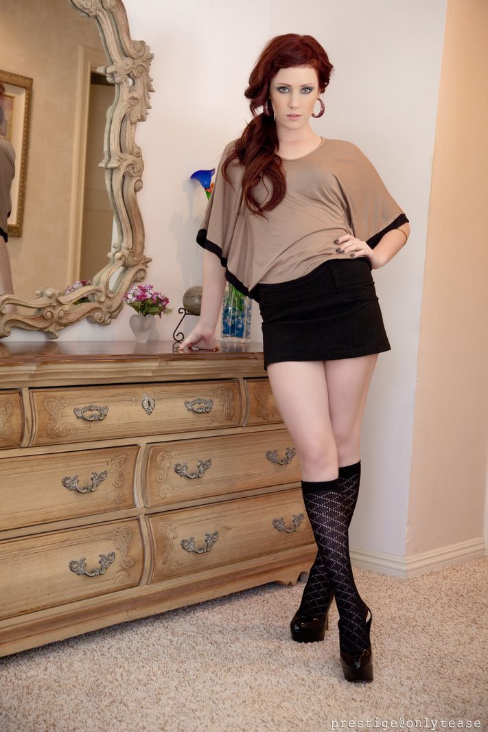 Pale redhead Elle Alexandra strips to knee sock and a thong afore a mirror foto porno #426816992
