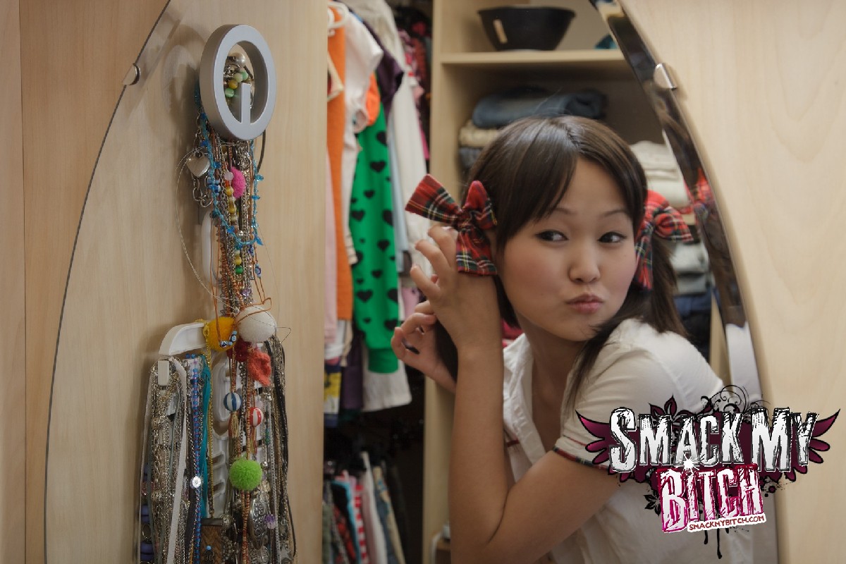 Japanese Cutie Is Caught Bare Naked While Getting Dressed In A Mirror