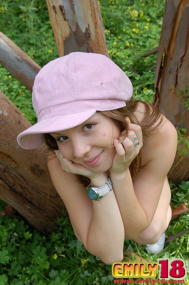 Charming young girl goes topless in the woods while wearing a funky hat porno foto #422475489