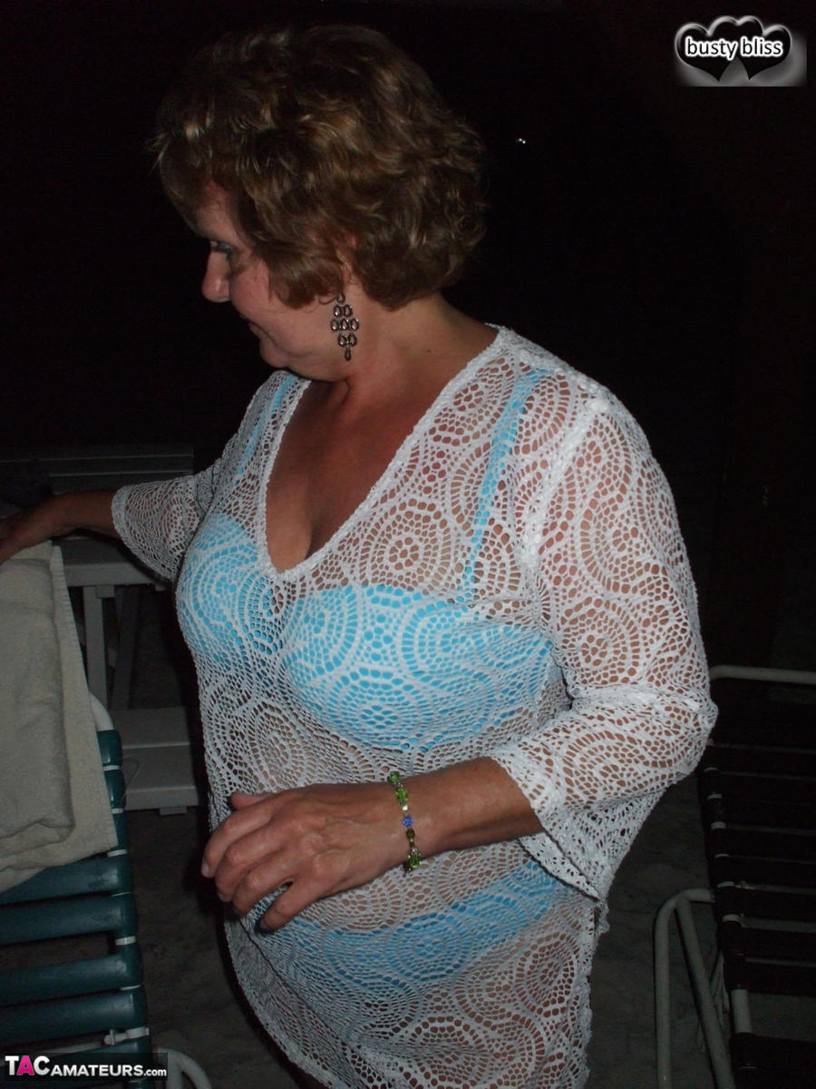 During her adulthood, Busty Bliss goes naked and then displays commendations on her breasts.