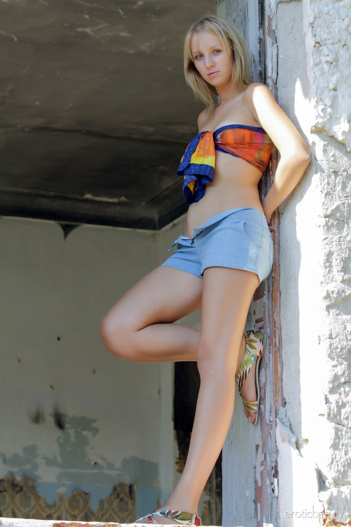 Blond teen Ilona D doffs tube top and shorts to get naked in a ruined building photo porno #426949584