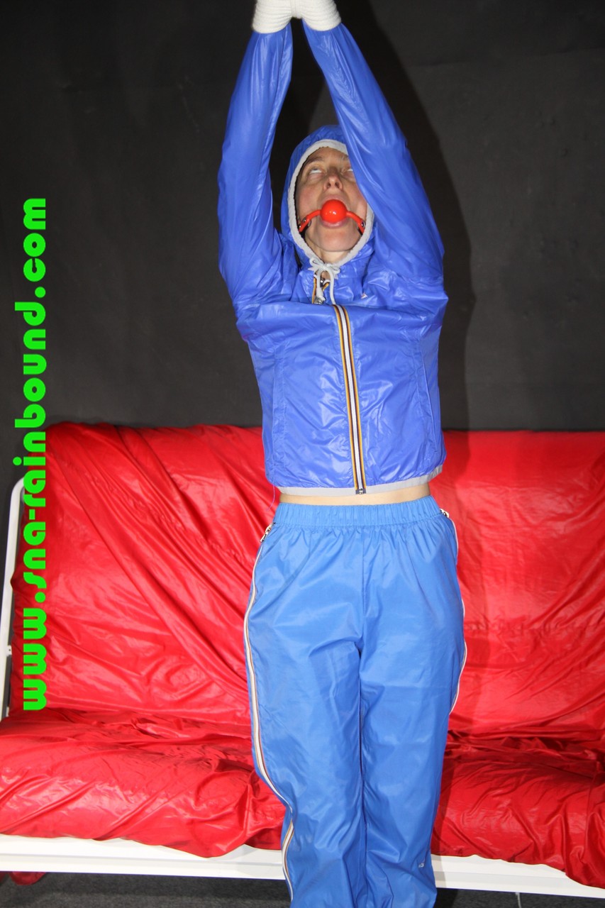 Sexy Sonja being tied and gagged overhead with ropes wearing a sexy blue shiny foto pornográfica #422734488