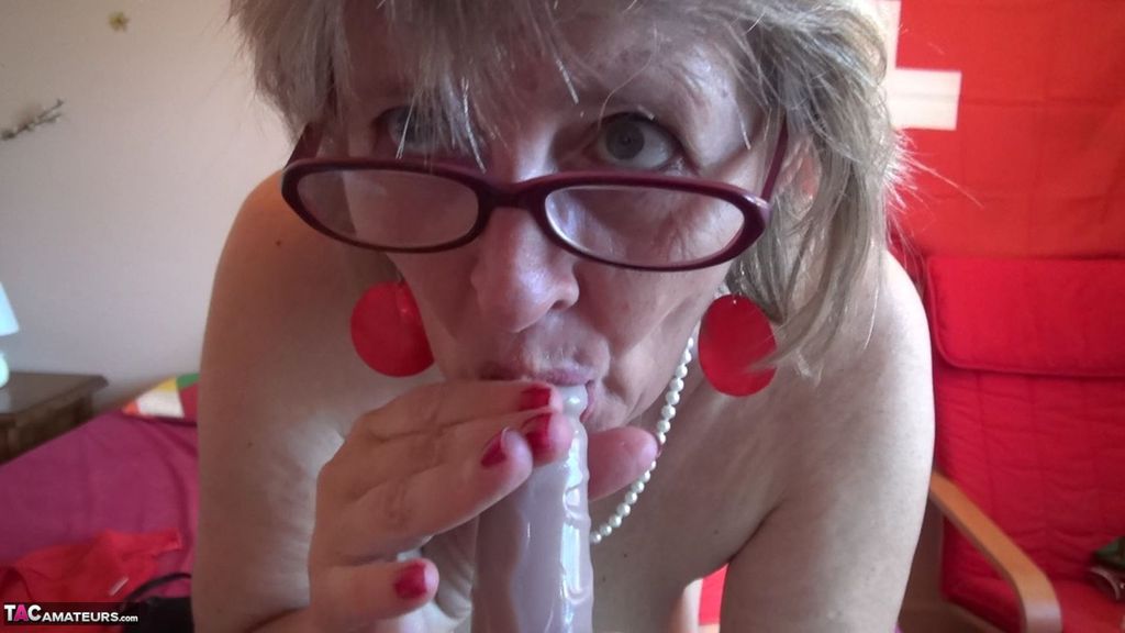 Old amateur Abby Roberts sucks and tugs on a cock with her glasses on porn photo #428605916