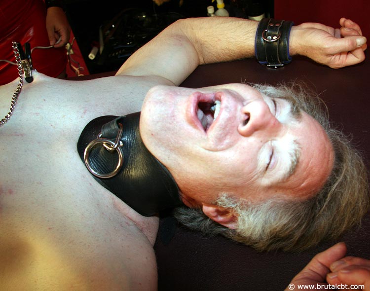 A white woman screams at a man who is restrained during CBT.