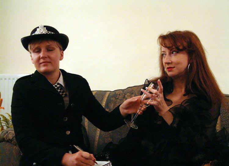 Redheaded woman indulges in lesbian foreplay with a British policewoman photo porno #425324549