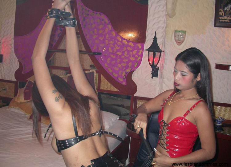 Lesbian Domme Asian lesbian femdom in leather foto porno #427308323