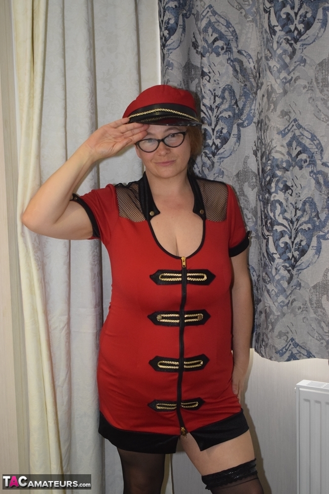 Older first timer looses her saggy breasts from her uniform on a bed foto porno #423154184