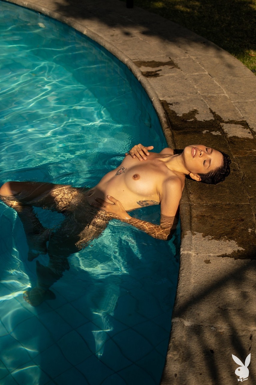 Centerfold model Alejandra La Torre sports short hair while nude in a pool porn photo #425326691