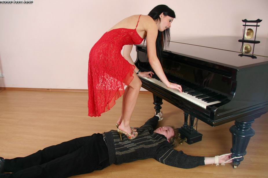 Pretty student humiliates her submissive music teacher at a grand piano foto porno #422738623