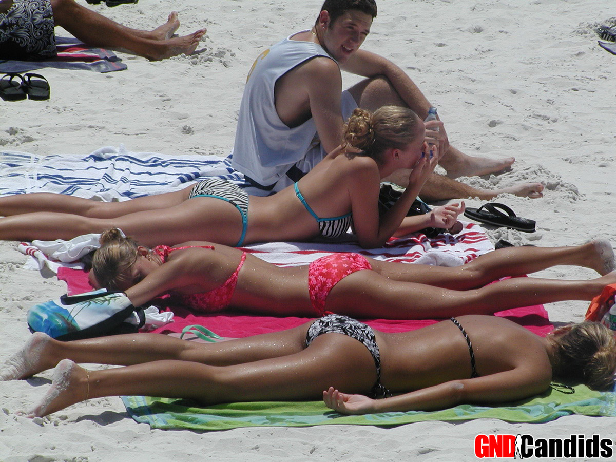 Hot tanned girls ass in tight bikinis at the beach photo porno #426495467
