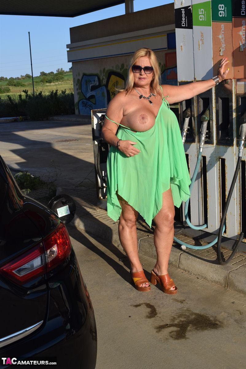 Thick amateur Nude Chrissy exposes her boobs and butt at a gas station porn photo #428050695
