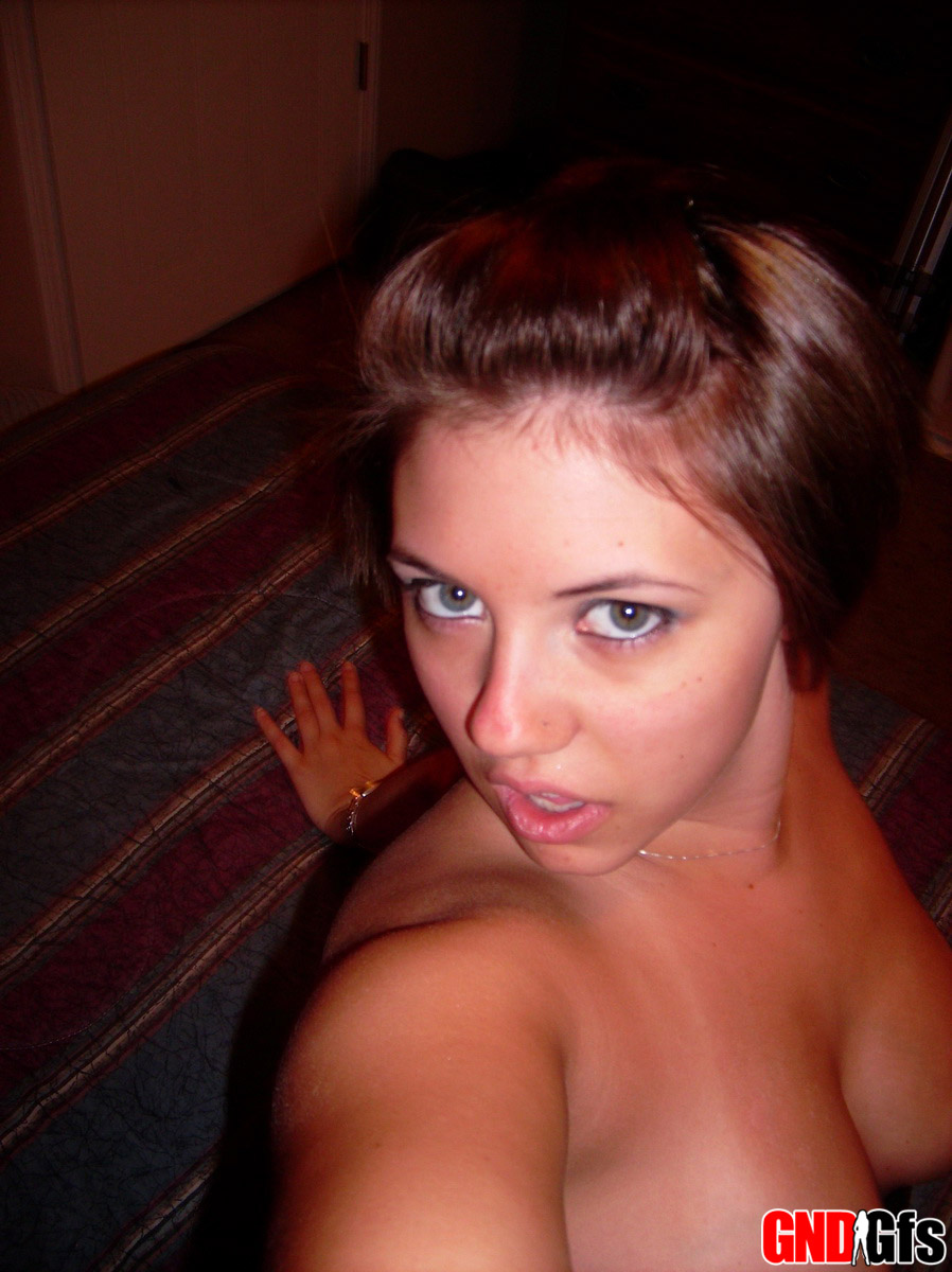 Chubby Amateur With Short Hair And Big Tits Takes A Series Of Self Shots
