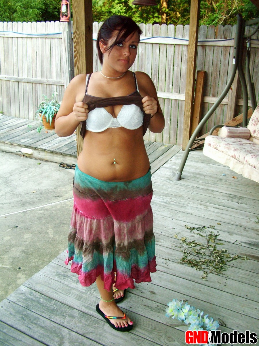 Chubby amateur Roxy takes off her shirt to pose on a patio in her brassiere porn photo #426099888