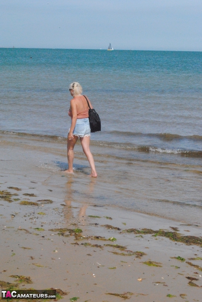 Older platinum blonde Dimonty takes a dip in the ocean while totally naked porno fotoğrafı #425641749