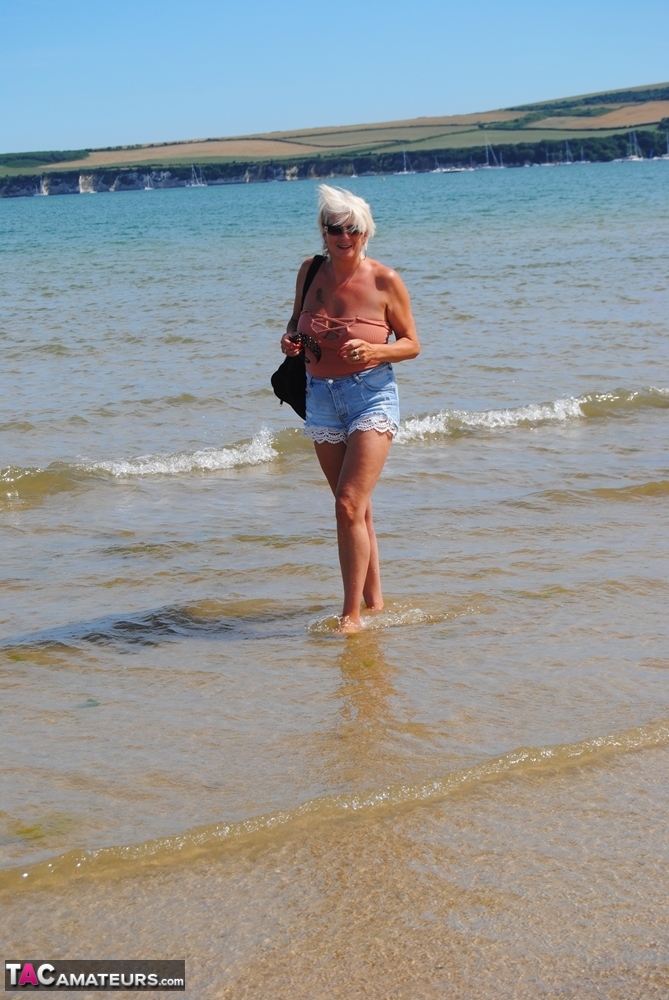 Older platinum blonde Dimonty takes a dip in the ocean while totally naked porno fotoğrafı #425641750