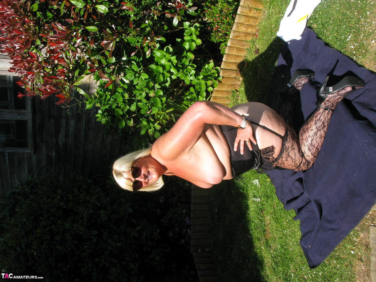 Mature blonde fatty Chrissy Uk gets naked in nylons in her backyard porno foto #428371054