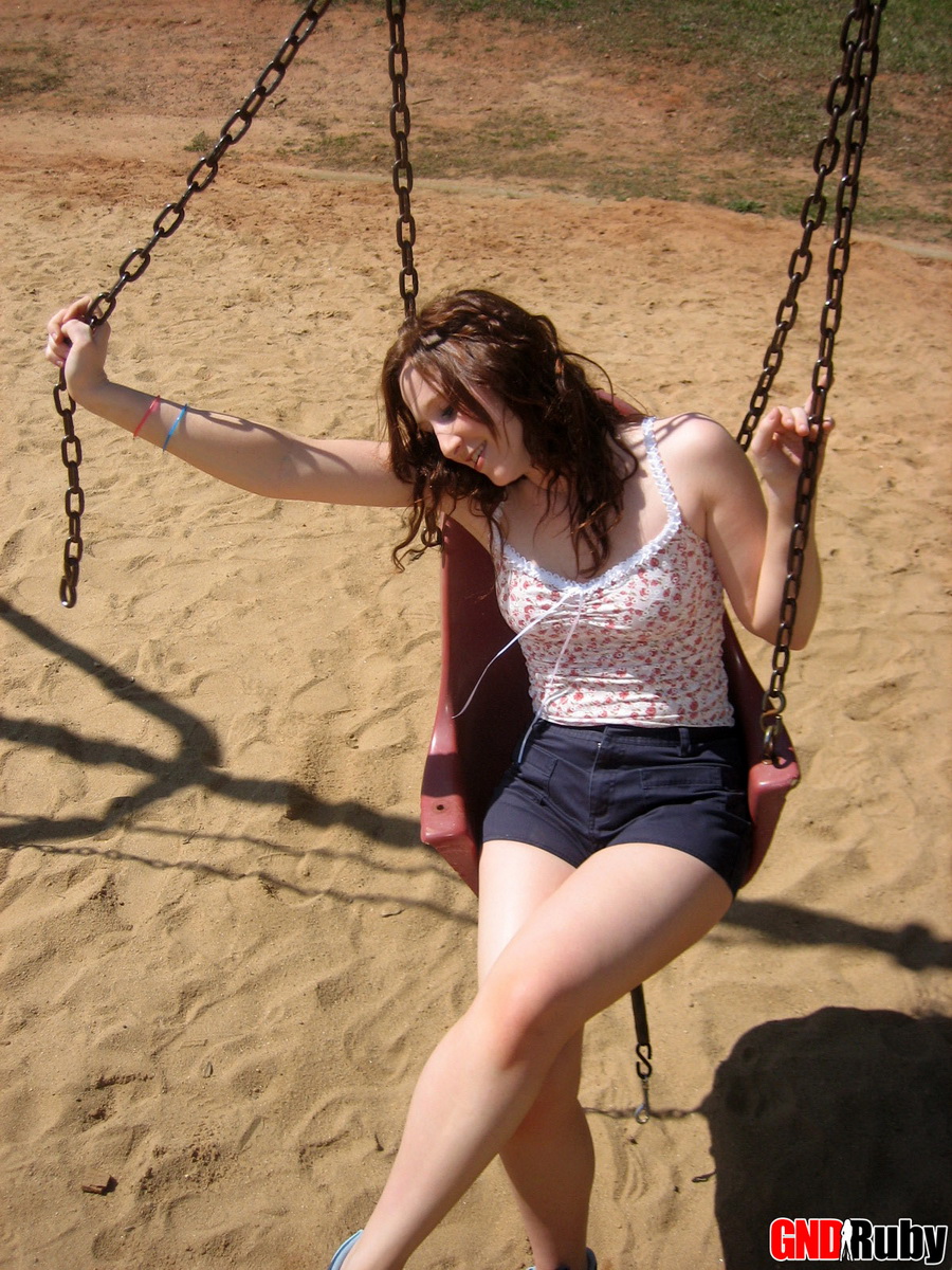 Red headed cock tease Ruby plays on the swing set at the public park porn photo #428680059