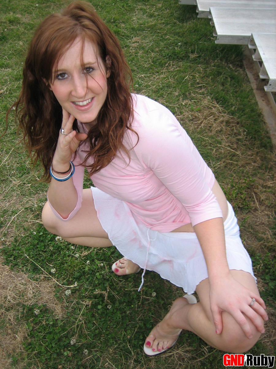 Natural redhead flashes her upskirt panties on a bleacher at a ballpark foto porno #424211217