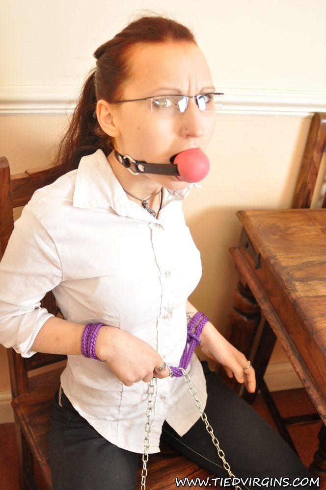 Geeky redhead sports a big ball gag while restrained in chains porn photo #427898666 | Tied Virgins Pics, Fetish, mobile porn