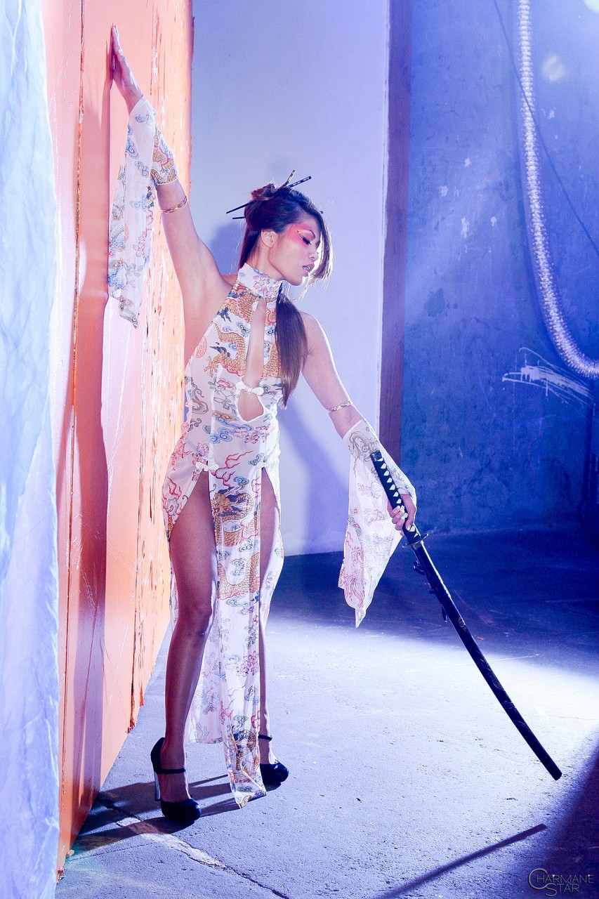 Asian Model Charmane Star Wields A Samurai Sword While Exposing Herself