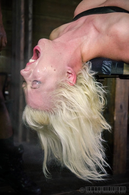 Cherry Torn, a blonde slave who is bound with leather for footwork and forced to fight with the deepthroat tactics.