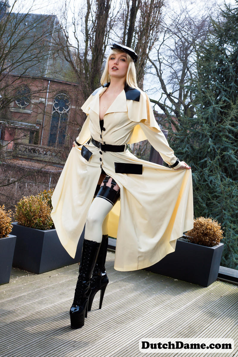 Classy blonde flashes the village below on her patio in latex attire ポルノ写真 #426969821