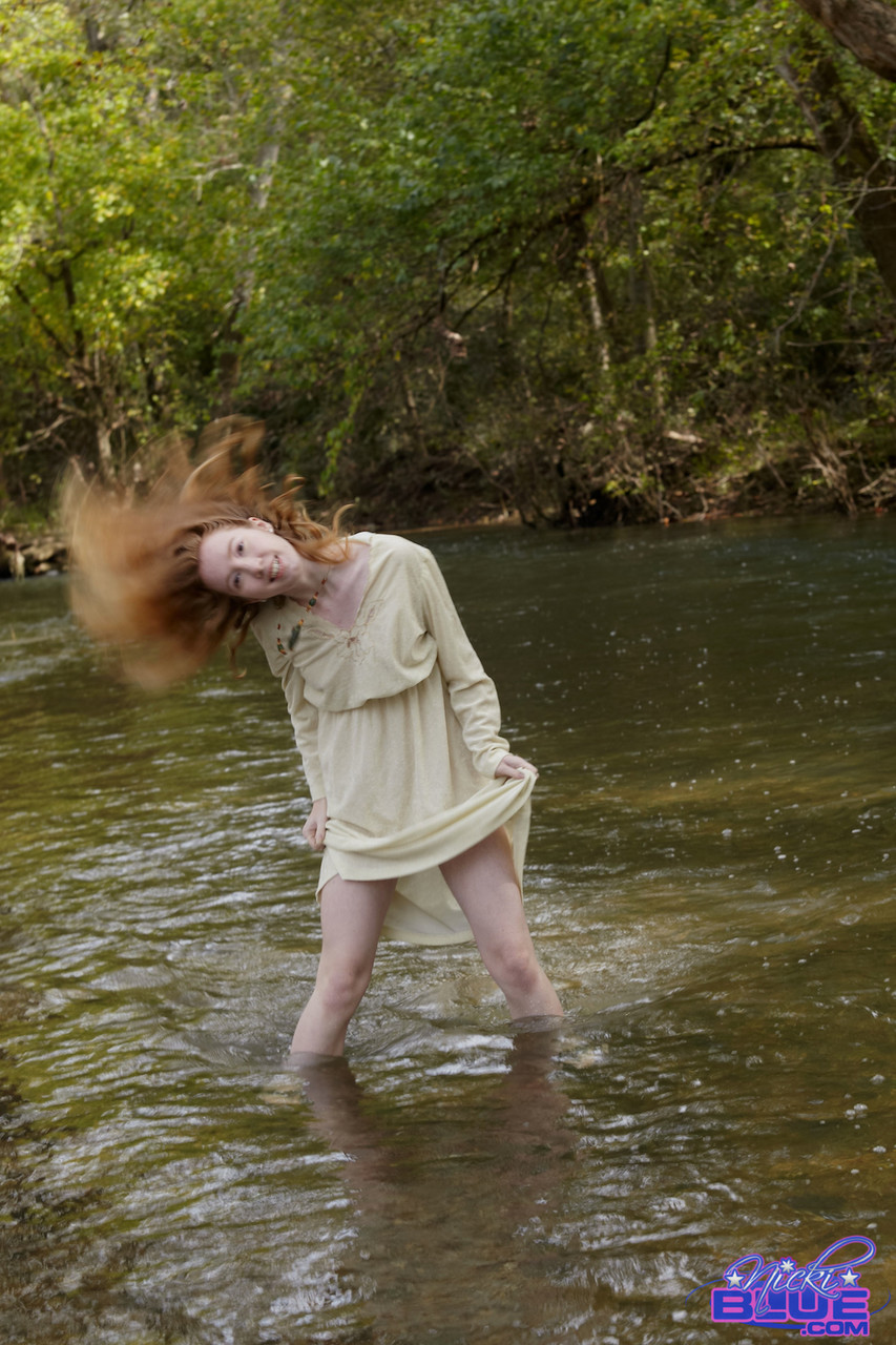 Natural redhead Nicki Blue shows some leg while wading into a shallow stream zdjęcie porno #425333624