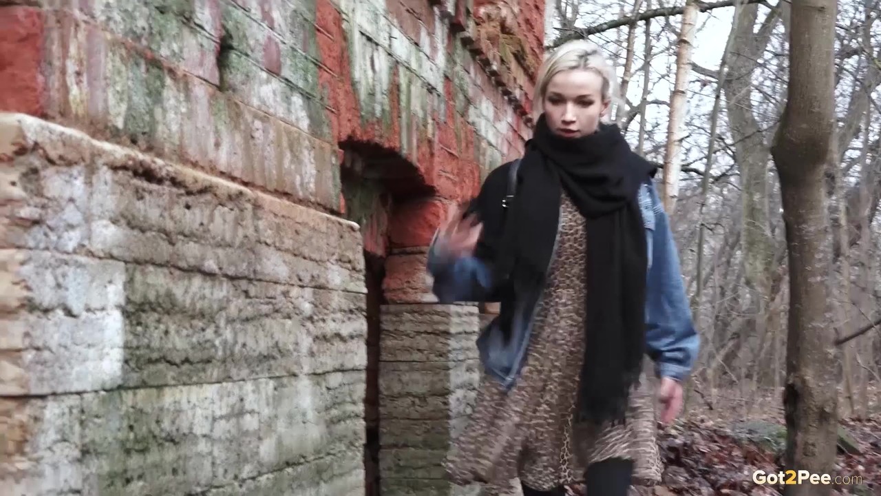 Pretty blonde Masha pulls down her tights for a piss by an abandoned building porno foto #427288063