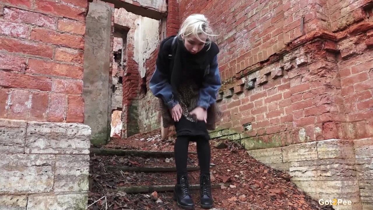 Pretty blonde Masha pulls down her tights for a piss by an abandoned building Porno-Foto #427288067