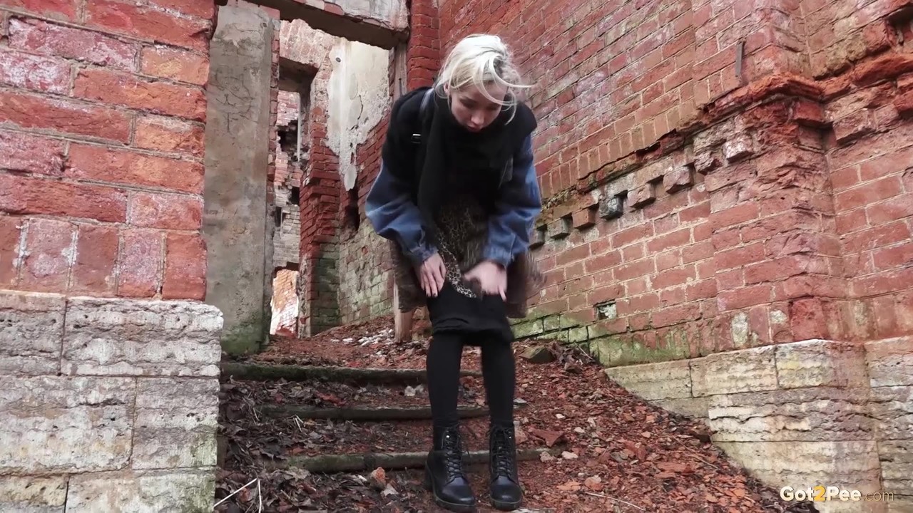 Pretty blonde Masha pulls down her tights for a piss by an abandoned building порно фото #427288067