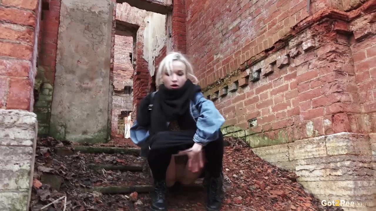Pretty blonde Masha pulls down her tights for a piss by an abandoned building porno foto #427288069