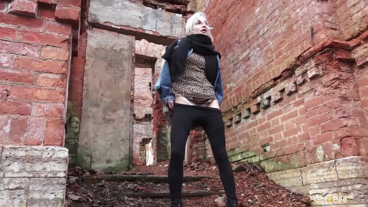 Pretty blonde Masha pulls down her tights for a piss by an abandoned building ポルノ写真 #427288111