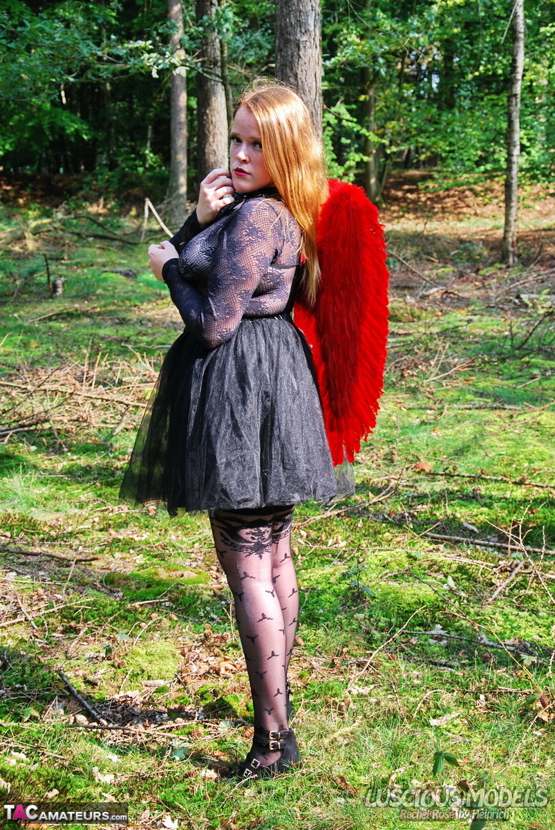 Amateur solo girl sports angel wings while modelling lingerie on a tree stump ポルノ写真 #428731733