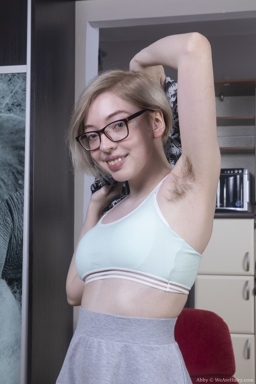 Teen amateur Abby shows her hairy underarms and vagina with her glasses on porn photo #425539275