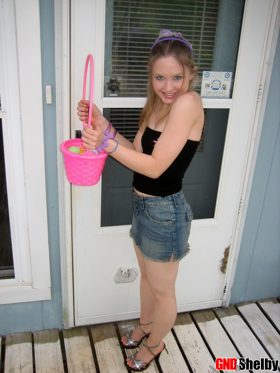 Charming young girl exposes a nipple while collecting Easter eggs foto porno #425462089