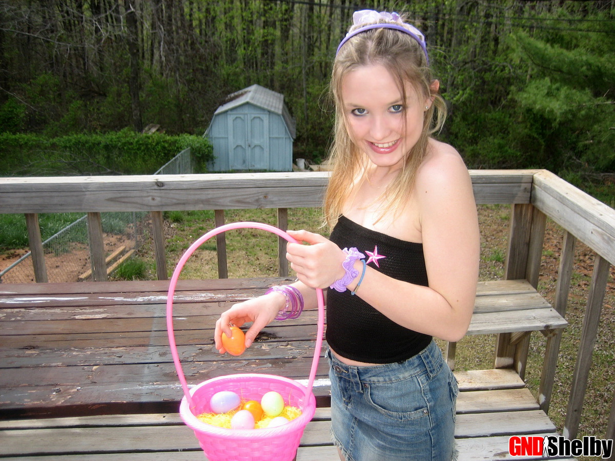 Charming young girl exposes a nipple while collecting Easter eggs Porno-Foto #425462099