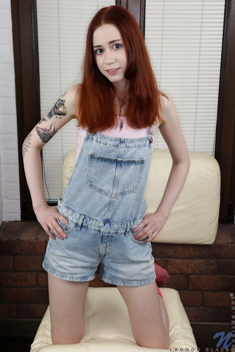 Young redhead Lagoon Blaze showcases her pussy in nylon socks porno foto #427535543