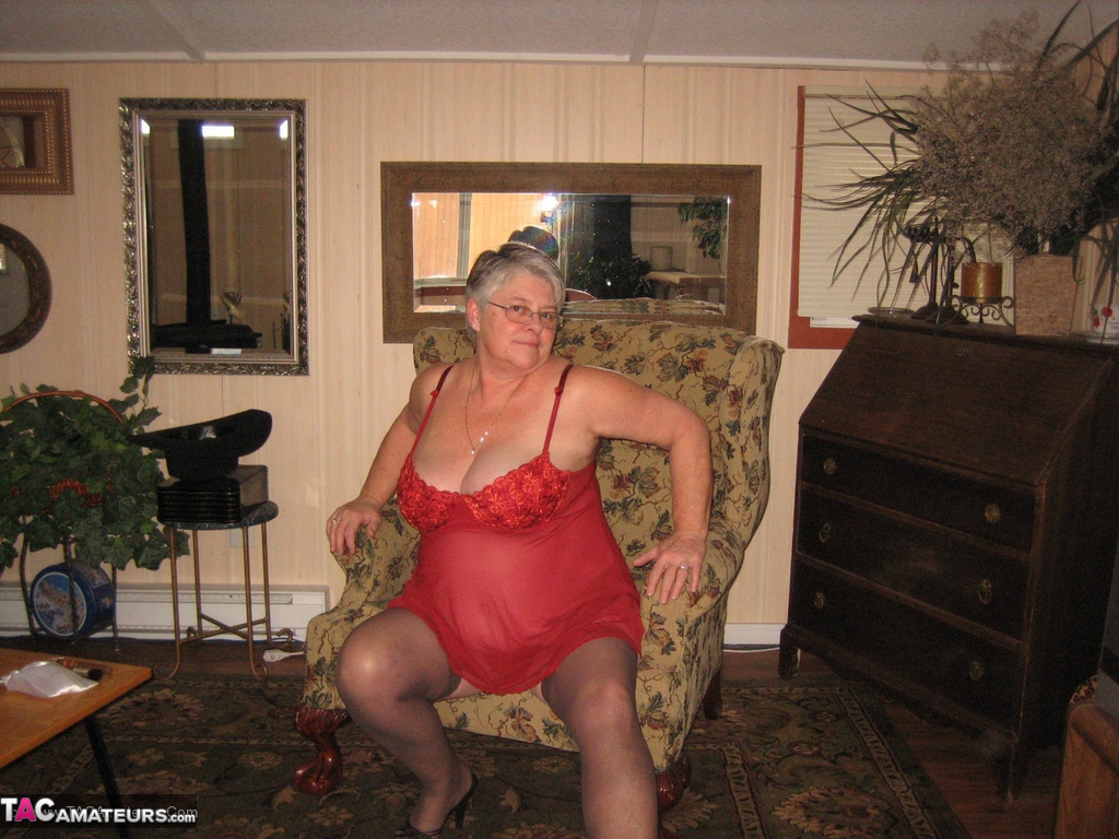 Old woman Girdle Goddess slips off red lingerie to get naked in stockings photo porno #428515649