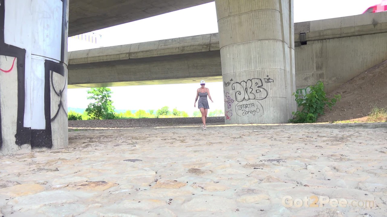 Chloe Lamour squats near a bridge to piss zdjęcie porno #428774334